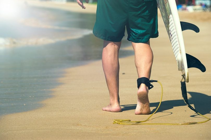 How to Attach a Surfboard Leash