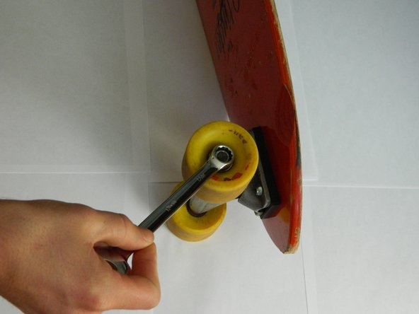 How to Put Wheels on a Skateboard - Remove the old skateboard wheels nuts