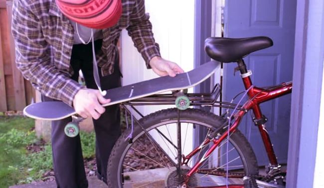 How to Carry a Skateboard on a Bike - Get a skateboard bike rack
