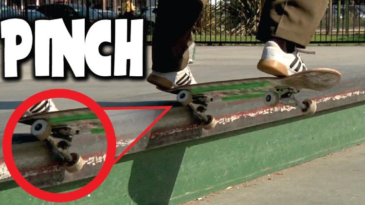 Pinch the skateboard